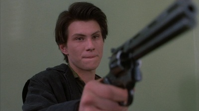 Jason "JD" Dean (Christian Slater) pulls out his Colt Python against Kurt Kelly and Ram Sweeney.