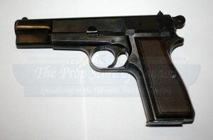 Screen-used Browning Hi-Power from Indiana Jones and the Kingdom of the Crystal Skull.
