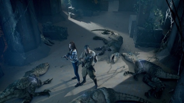 Riddell and Amy stand surrounded by neutralised velociraptors in "Dinosaurs on a Spaceship".