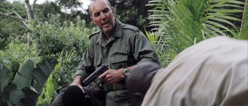 Arnold Vosloo as Colonel Coetzee with an H&K USP in Blood Diamond.