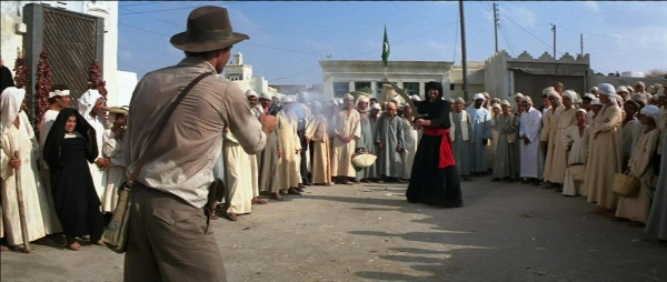 Indy fires his Smith & Wesson Mk II Hand Ejector at the swordsman, rather than get into a sword fight.