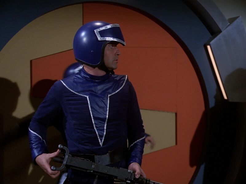 File:Buck Rogers in the 25th Century - S01E08 - Return of the Fighting 69th - Buck Thumbing Trigger of M2 Aircraft.jpg