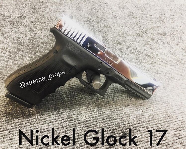 File:F8 Screen Used Glock 17 Nickel Slide.jpg