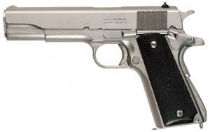 Satin Nickel M1911A1 - .45 ACP. Manufactured on license by Remington Rand - nickel plated later by its owner.
